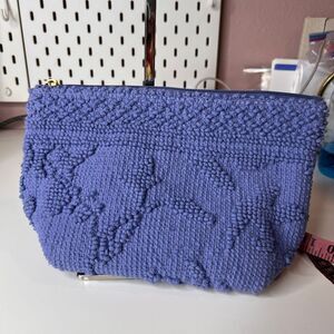 Shiraleah Sienna zip pouch features a textured chenille cotton exterior with a t